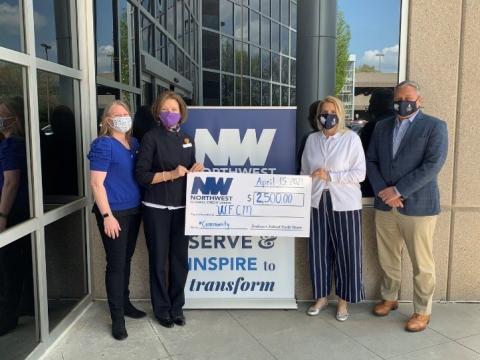 Left to Right, Harmonie Taddeo, Executive Director of WFCM; Mary Ellen D'Andrea, Director of Development at WFCM; Michelle Sandy, Community Engagement Manager at Northwest, and Jeff Bentley, President and CEO of Northwest