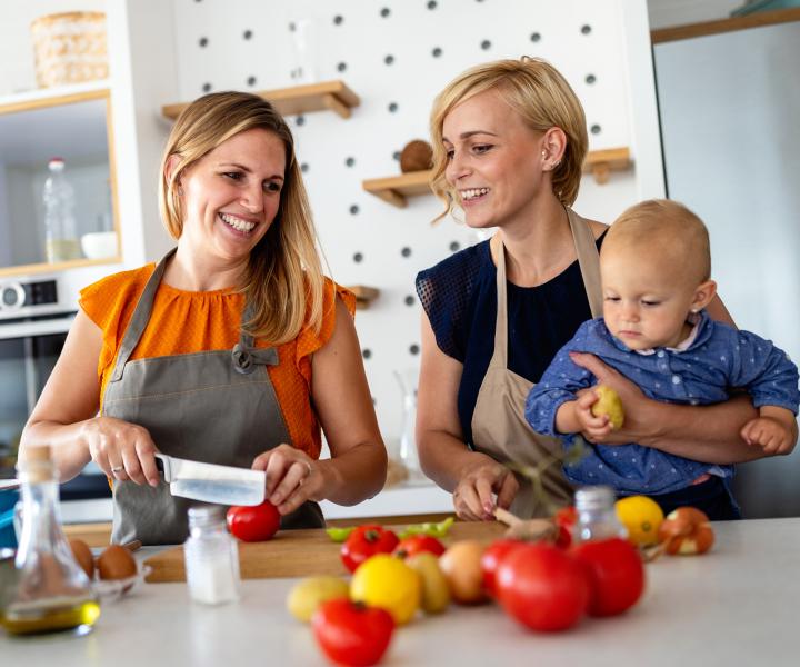 Couple and baby in kitchen