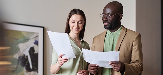 Woman and Man looking at paperwork